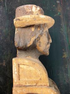 Man with Hat Carving with traces of paint